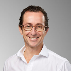 Headshot of Dan Greengarten.