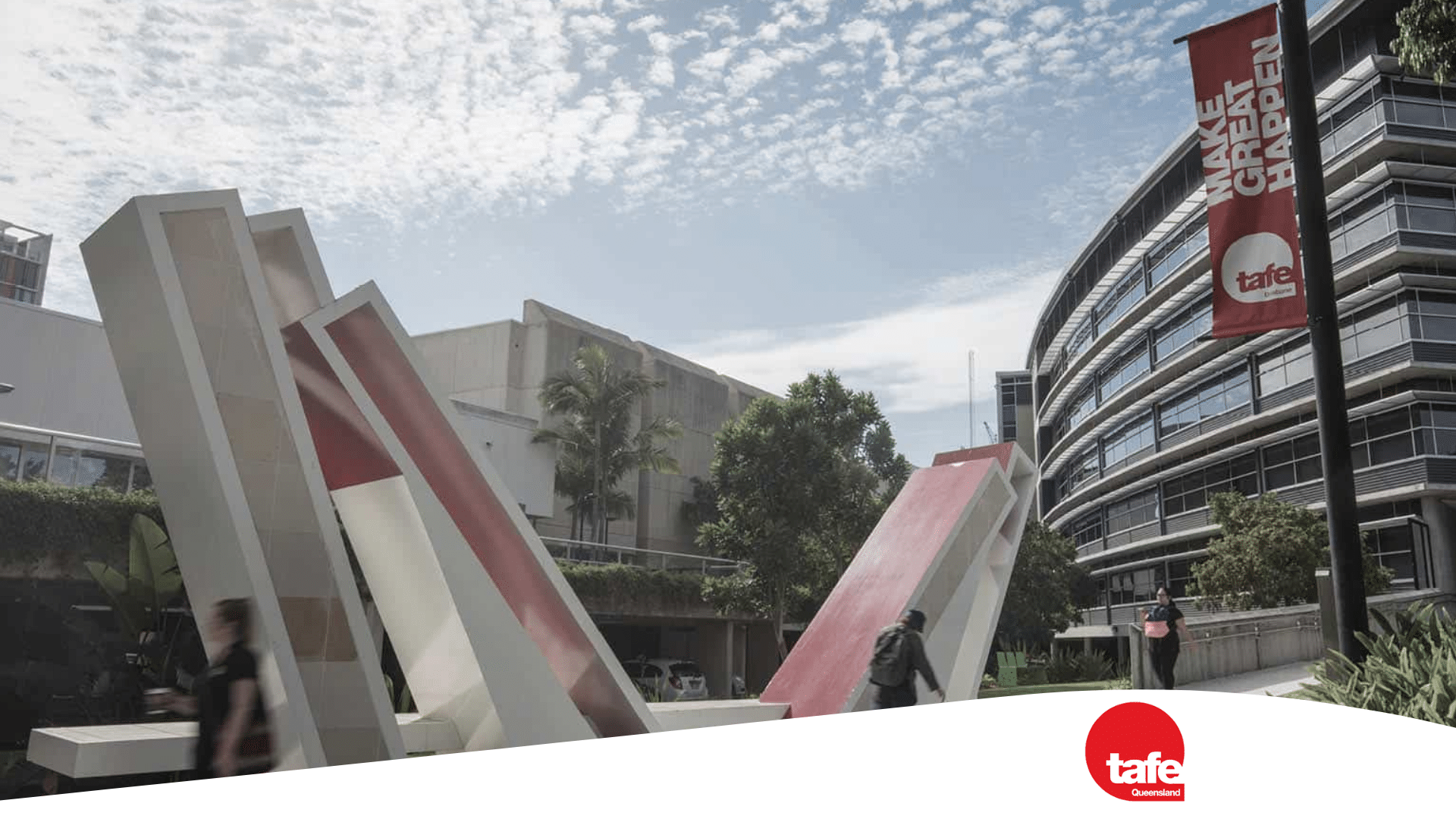 Students walking on a TAFE Queensland campus.